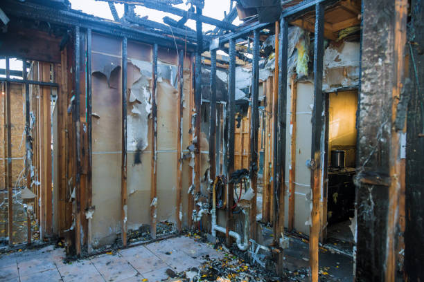 Professional Fire Damage Restoration technician working in Algoma, WI